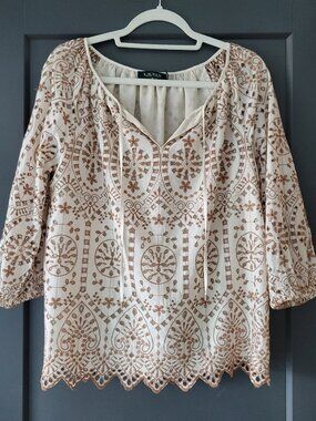 Lauren Ralph Lauren  Cream Peasant Blouse features intricate tan embroidery